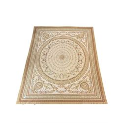 Late 20th century French style needle work Aubusson rug, circular field decorated with floral garlands and flower head motifs, multi-band border