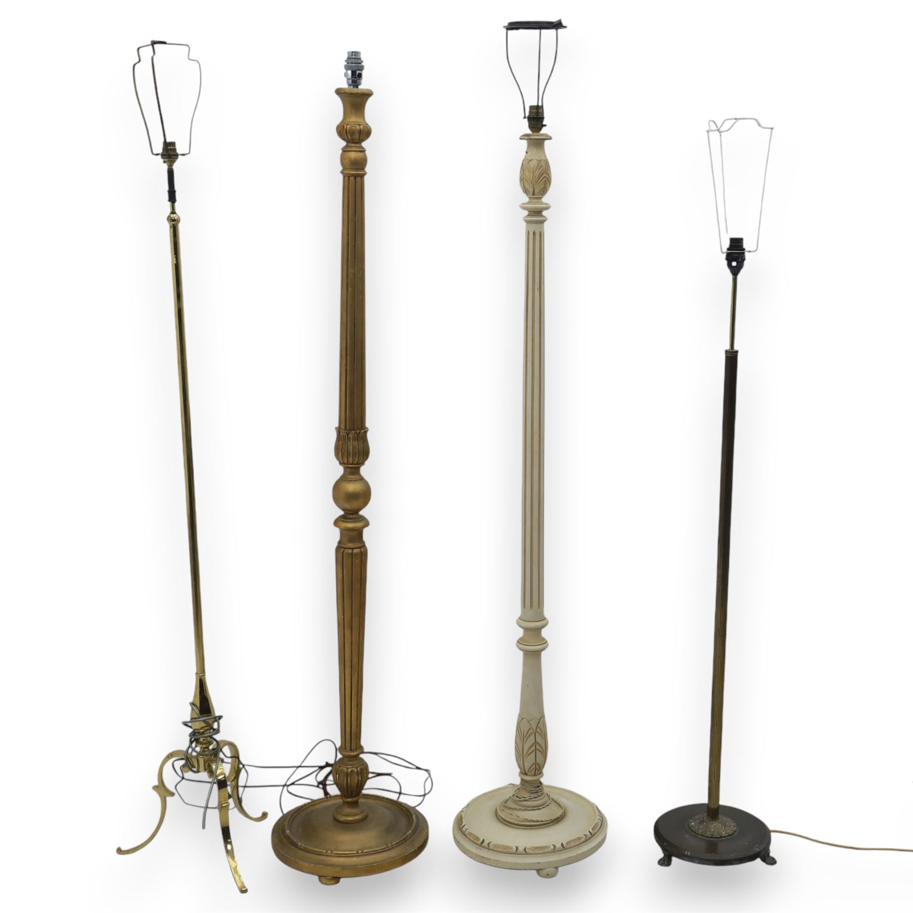 Mid-20th century cream painted standard lamp, gold painted lamp and two brass lamps (4)