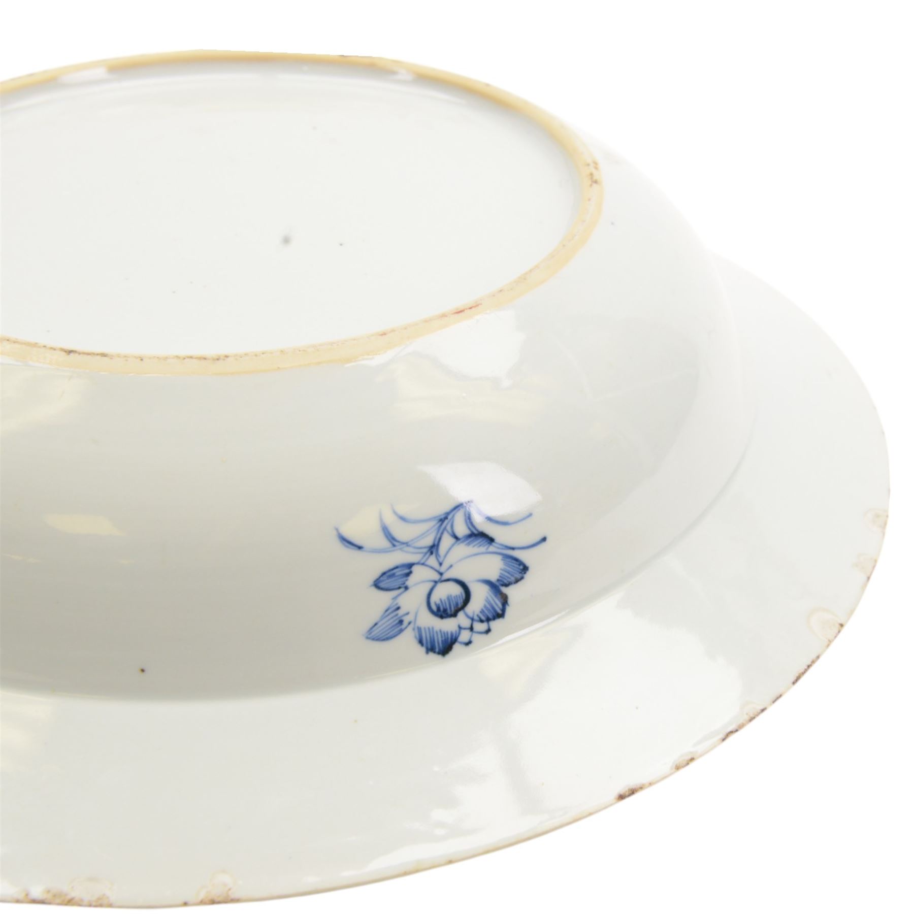 Large 19th century Chinese export blue and white bowl, of circular form, the dished centre decorated with pagodas, fence, and pine and willow trees, within a cell border with flower head and scroll detailed shaped reserves, the rim with conforming decoration of huts and trees, D39.5cm