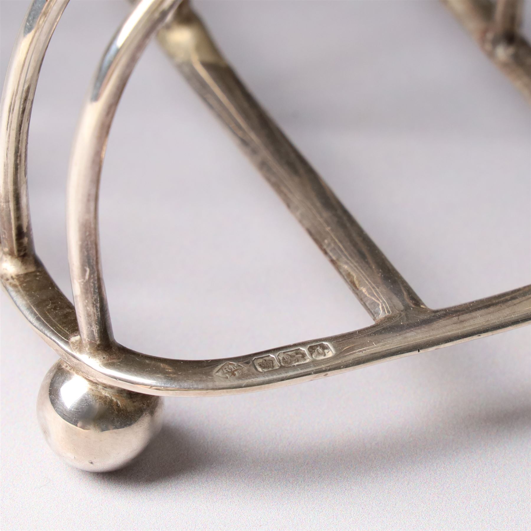 Edwardian silver six division toast rack with loop handle and ball feet Sheffield 1908 Maker Martin Hall & Co