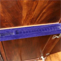Willis & Gambier - mahogany bedroom wardrobe, projecting cornice with two additional rails, panelled doors with trouser rack and blue baize trinket, enclosing a shelf above a wooden clothes rail and shoe rack, raised on bracket feet 