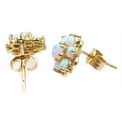  Pair of 9ct gold opal flower head earrings, stamped 375  