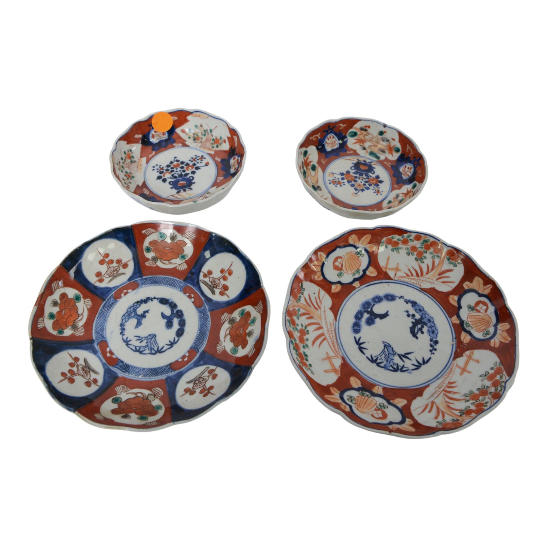 Japanese ceramics, comprising pair of Imari plates, pair of Imari bowls, pair of Satsuma bottle vases and two pairs of baluster form vases each decorated with birds amongst flowering branches, tallest vase H23cm