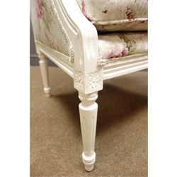  Cream painted French style armchair upholstered in floral fabric, turned and fluted supports, W65cm  