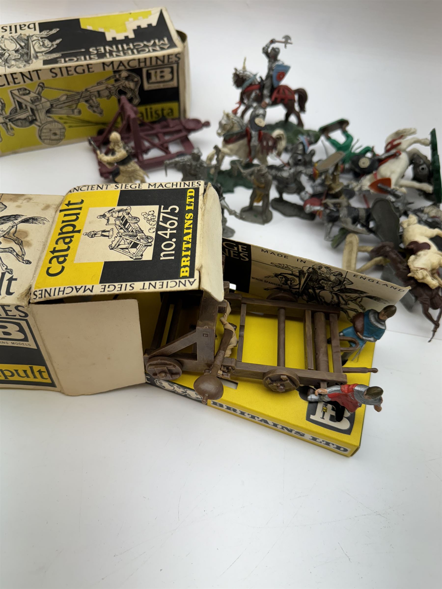Two Britain's Ancient Siege Machines, comprising Balista and Catapult and a collection of plastic knights and soldiers, including Britains examples etc