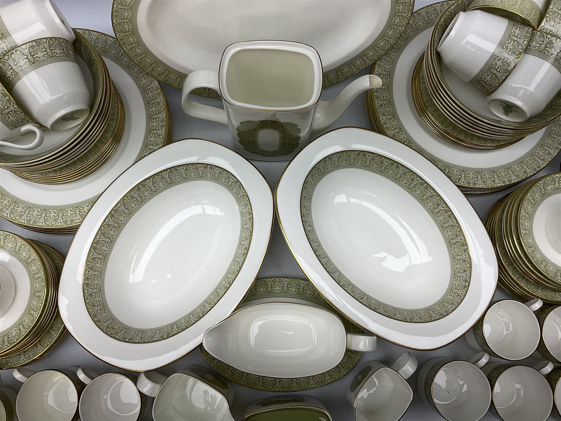 Royal Doulton Sonnet pattern part tea and dinner service, including  twelve dinner plates, twelve bowls, twelve side dishes, two covered tureens, one meat platter, coffee pot, twelve coffee cans and saucers etc (approx 90)