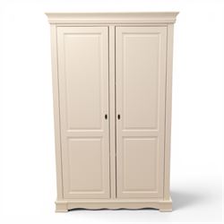 Modern white painted double wardrobe, fitted with two panelled doors, enclosing a hanging ...