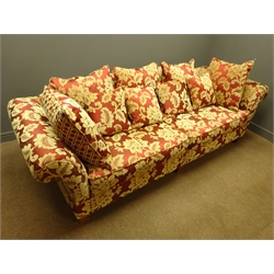  Grande four seat sofa upholstered in red and gold floral fabric, with scatter cushions, W255cm, D96cm - 18 months old  