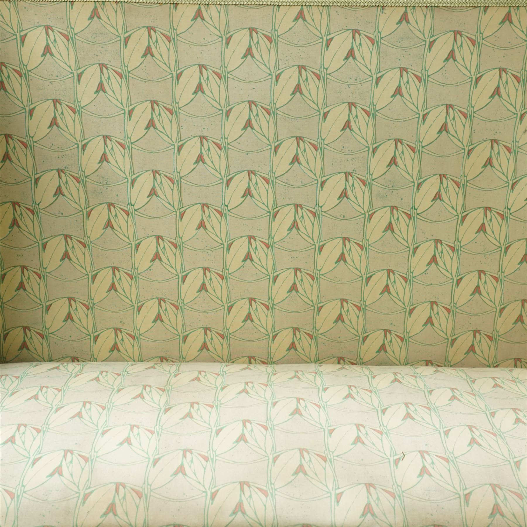 James Shoolbred & Co. (1814-1934) - Arts & Crafts high-back oak settle or hall-bench, the projecting cresting rail over a frieze decorated with stylised poppy pewter inlays, the drop-in sprung seat beneath high back and arms, flanked by tapering uprights terminating to shaped stile feet, upholstered in Archibald Knox patterned fabric with the original tapestry and horsehair upholstery beneath, applied plaque by James Shoolbred to underside, with stamped serial number W1573, circa 1890