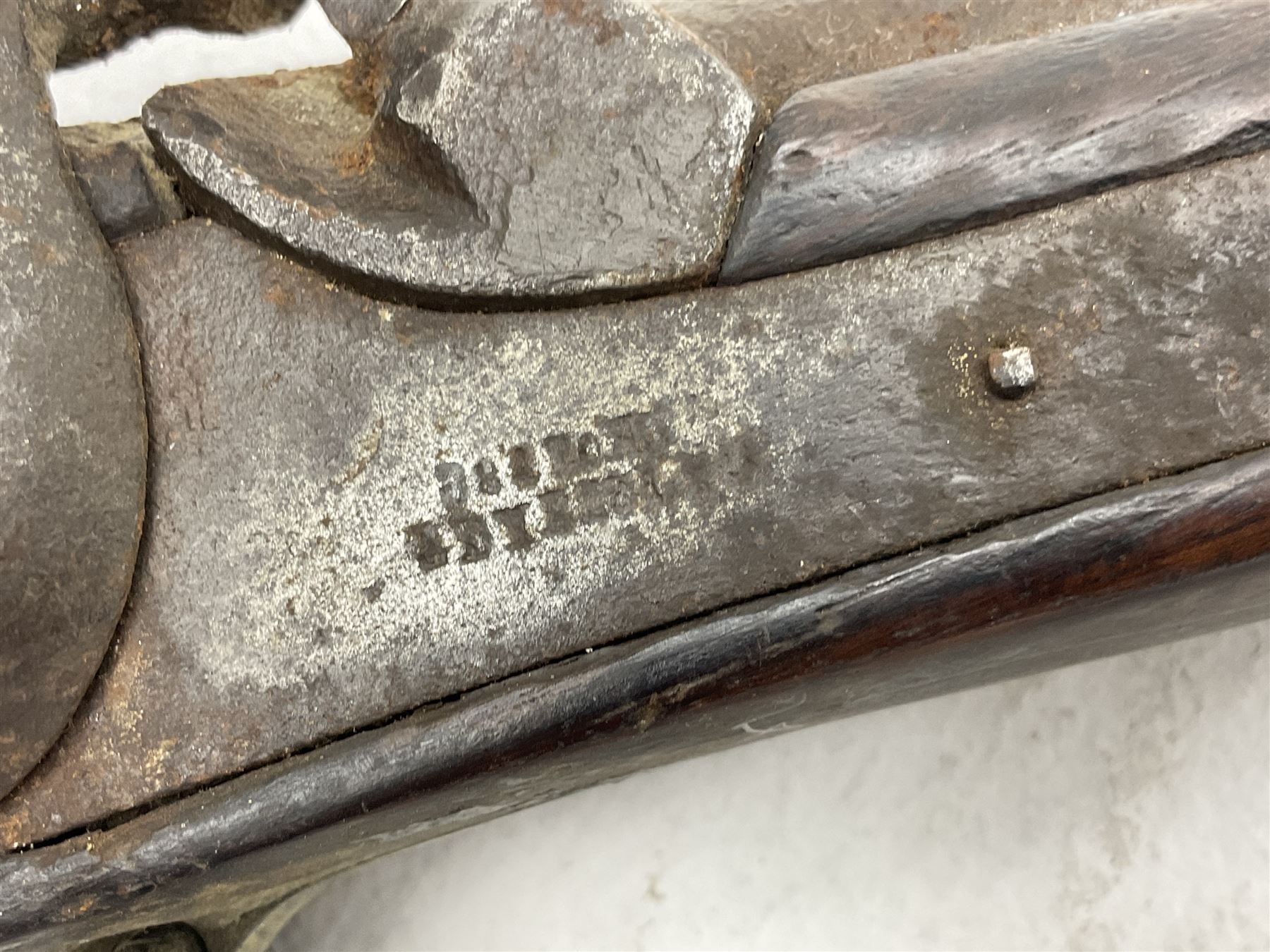 20th century Indian percussion musket, the 76cm barrel with two bands, indistinctly inscribed lock-plate, walnut full stock stamped 642 with brass butt and trigger guard and under barrel ramrod channel L121cm overall