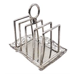 Edwardian silver five bar toast rack, with loop handle and crumb tray, the tray with pierced scroll rim, upon four compressed bun feet, hallmarked Roberts & Belk, Sheffield 1902, including handle H11cm