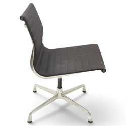 Charles and Ray Eames for Vitra - EA 105 chrome swivel chair upholstered in navy blue, raised on a four point chrome base