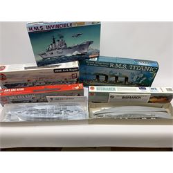 Ten plastic model kits of ships by Airfix, Revell, Dragon and Skywave, predominantly 1/600th scale including R.M.S. Titanic, HMS Invincible, two x HMS Ark Royal, HMS Fearless, HMS Hood, HMS Belfast, Bismarck etc; all boxed, most in factory sealed transparent packaging (10)