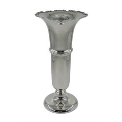 Silver trumpet shaped vase with wide flared rim and cast scroll decoration, by William Neale & Son, Birmingham 1924, approx 6oz