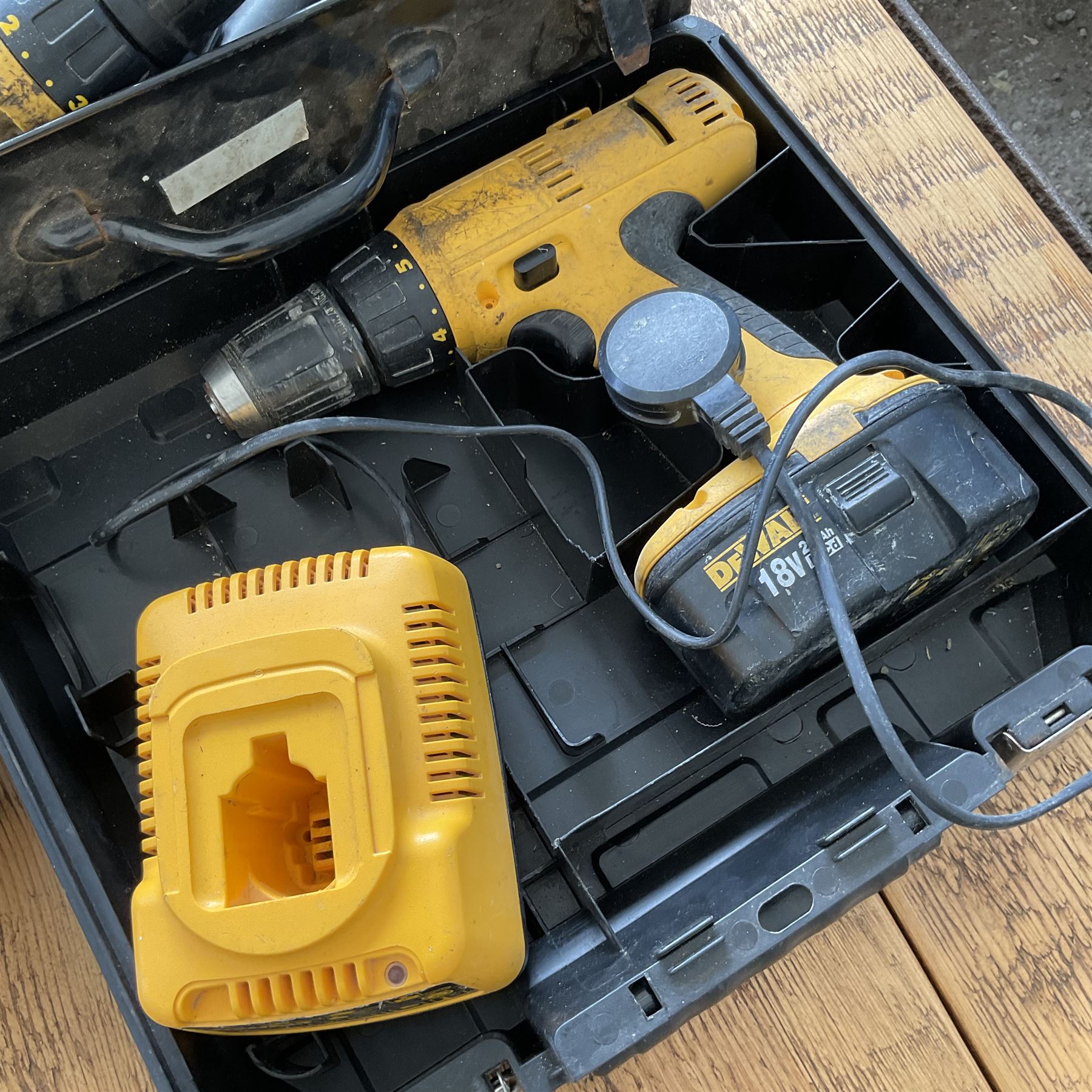 Three DeWalt battery drills with batteries and charger  and black and decker corded drill - THIS LOT IS TO BE COLLECTED BY APPOINTMENT FROM DUGGLEBY STORAGE, GREAT HILL, EASTFIELD, SCARBOROUGH, YO11 3TX