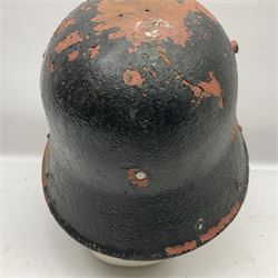 Three battlefield relic helmet shells - WWI German M16; WWI French Adrian; and WWII British (3)