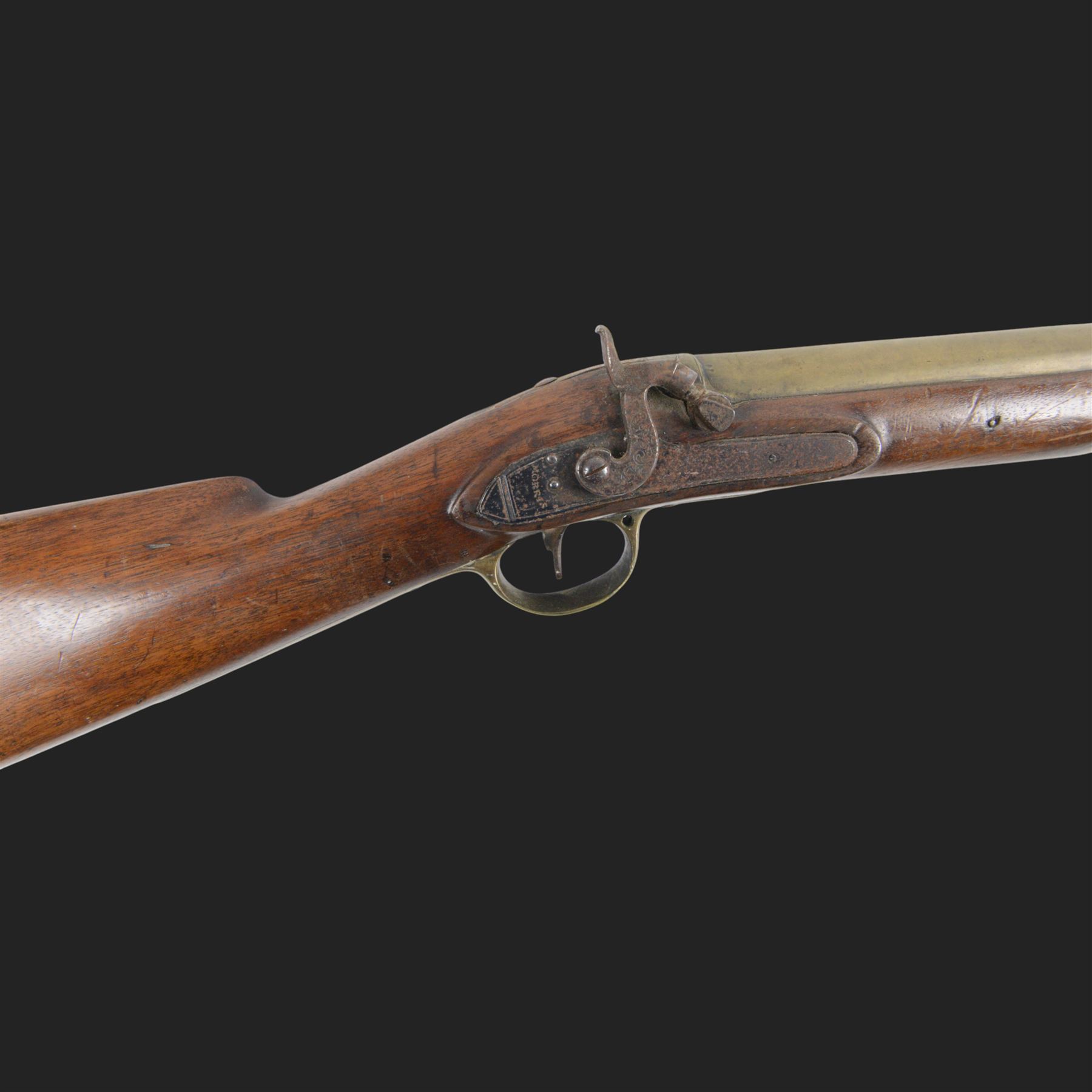 English flintlock blunderbuss, the 38cm brass barrel with proof marks and London to the top, with brass tip ramrod below, the lock engraved Morris, walnut stock with brass butt plate, overall L79cm