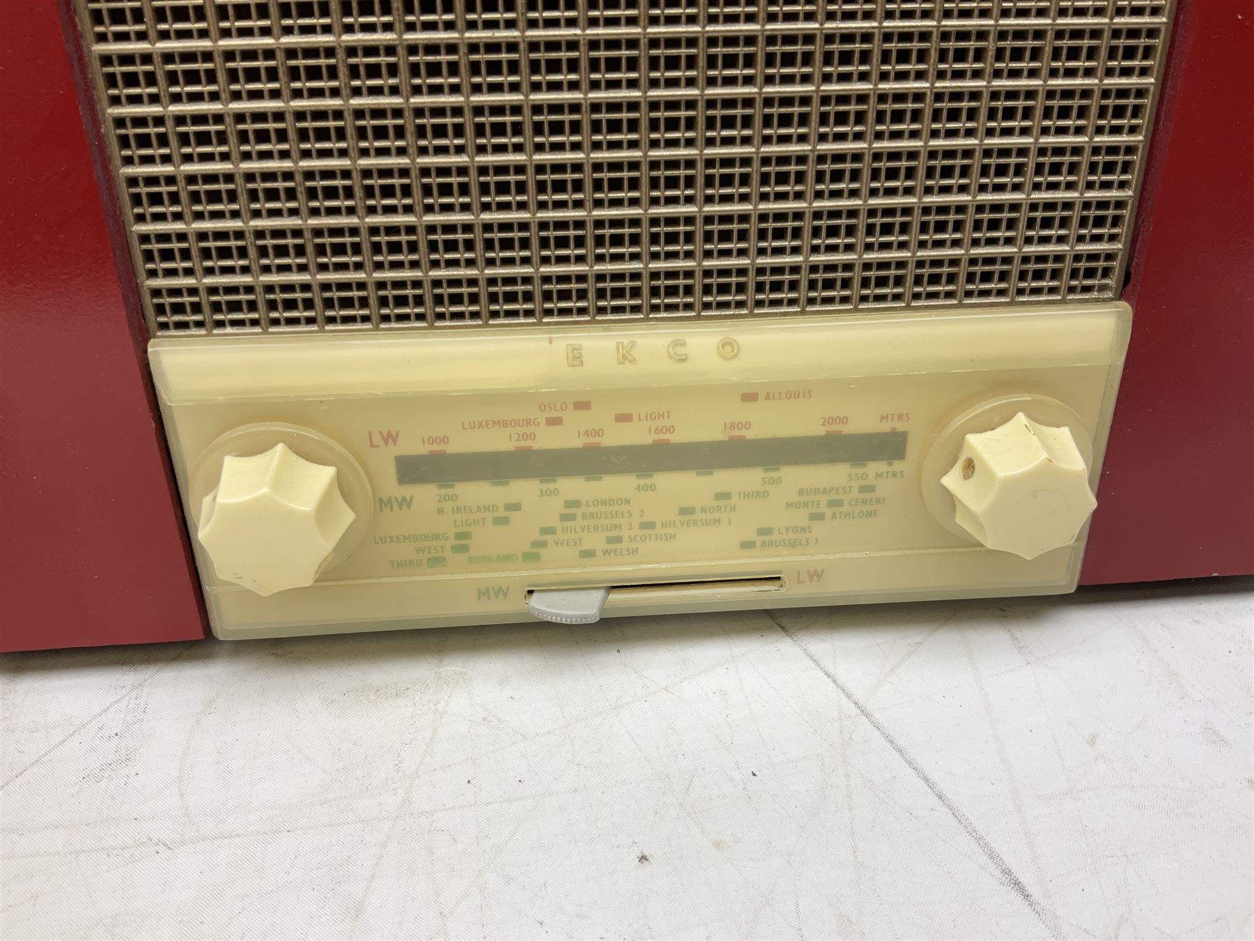 1950s Pye Type P43 cabinet radio in cream Bakelite case with orange knobs, W30cm H22cm D16cm, together with Ever Ready Sky Queen portable radio, Ekco portable radio in red case, Boxed Bush Special Edition 2002 Queens Golden Jubilee radio, Hacker Herald VHS radio (5)