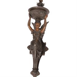 19th century wall sconce, the basket held aloft by a winged classical female upon a  moulded back plate, H63cm