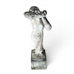 Weathered cast stone garden statue of a 'Shy Maiden', raised on square plinth base