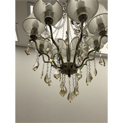 Eight branched chandelier with scrolling and beading decoration H73cm, with eight white pleated lampshades  