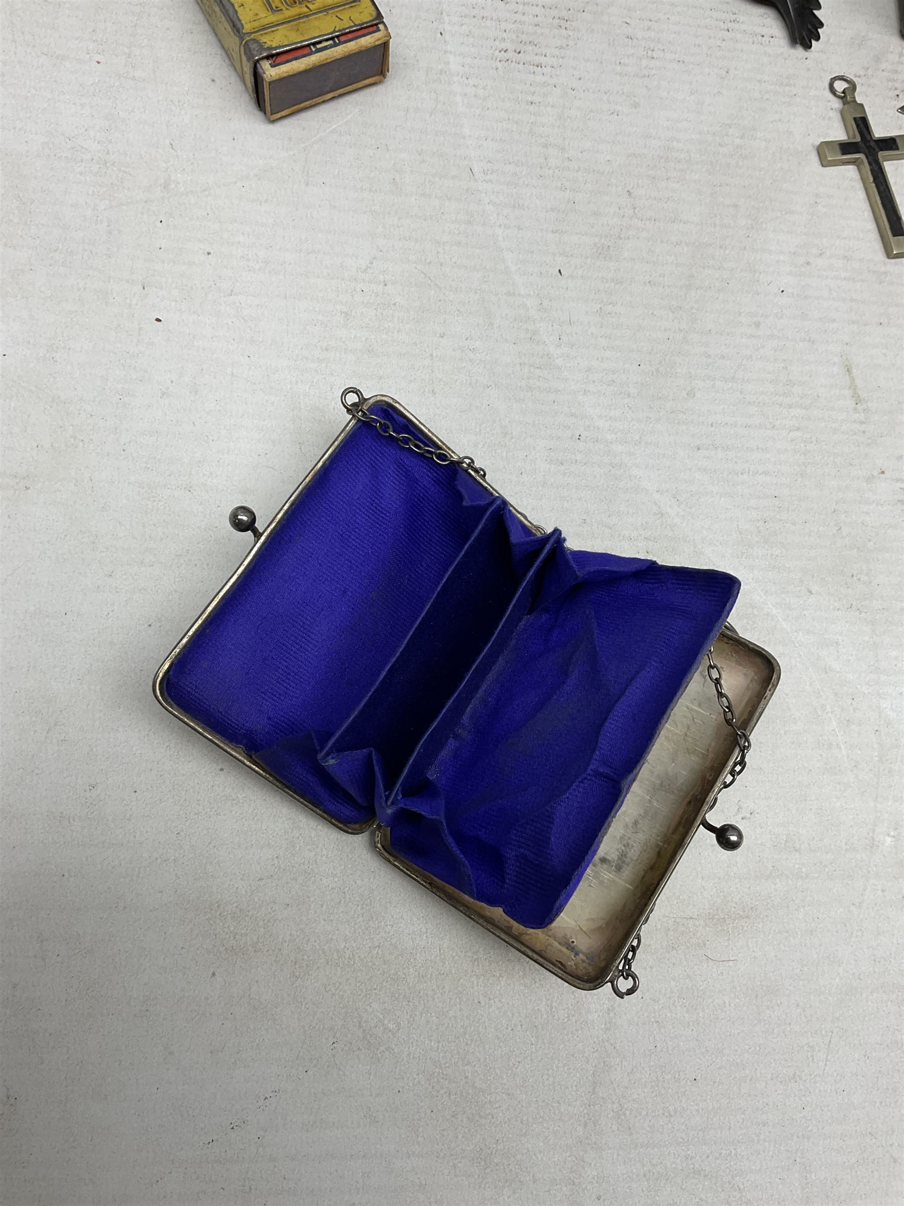 George V silver evening purse, the body of rectangular form with engraved decoration of swags and suspension chain, hallmarked G & C Ltd Birmingham 1918, together with Art Deco black beaded ladies bag (a/f), pair of hallmarked silver cufflinks, hallmarked silver bow brooch, 19th century portable inkwell, Victorian padlock stamped with the crown VR, etc