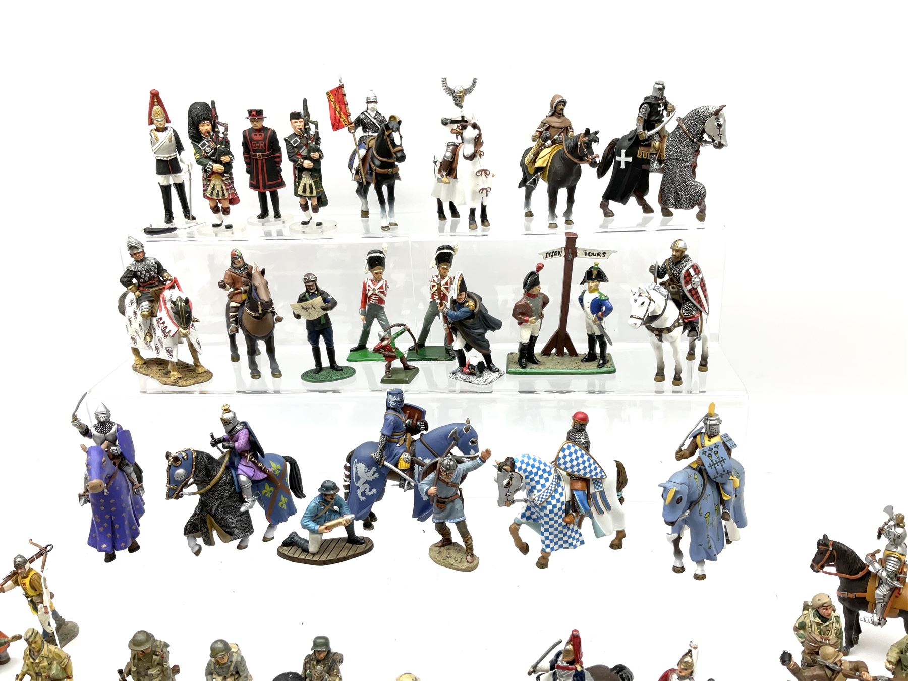 Over seventy cast metal figures by Del Prado, Corgi Icon, NLP etc including Napoleonic War, WW1 and WW2, knights on horseback and other mounted figures etc; all unboxed