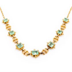 19th century gold emerald necklace, seven closed back octagonal cut and square cut emerald...