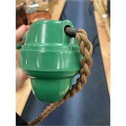 Jade green Bakelite telephone, of pyramid form with alphabet dial, brown braided handset cord and a base draw