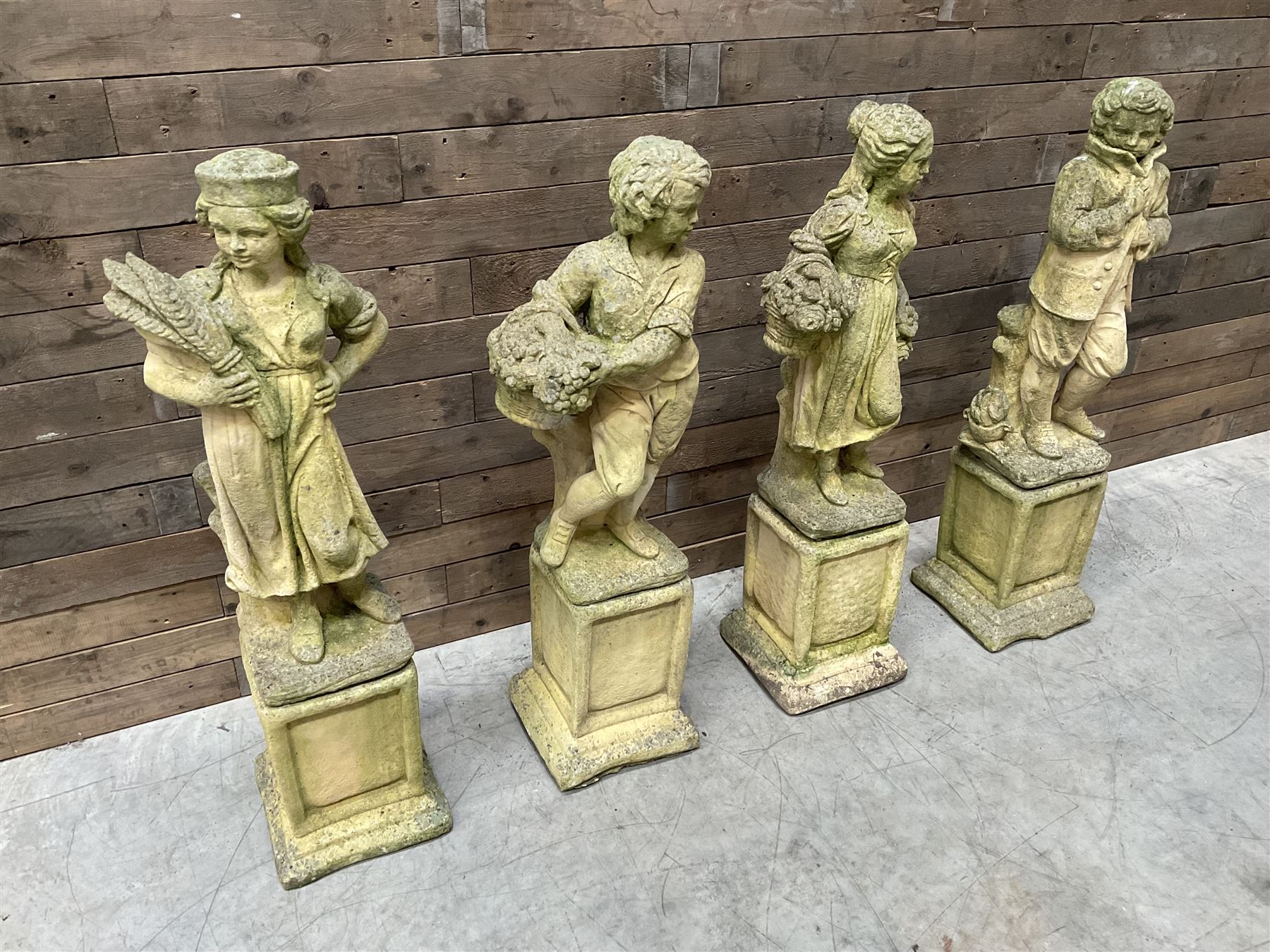 The Four Seasons - set of four cast stone garden figures on plinths