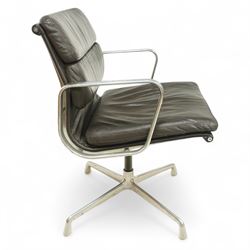 Charles and Ray Eames for Herman Miller - 1970s soft pad office chair model 'EA 207', low back and seat upholstered in chocolate brown leather flanked by open aluminium arms, raised on a non-swivelling aluminium base with manual screw adjustment function