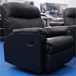Two reclining armchairs upholstered in black faux leather