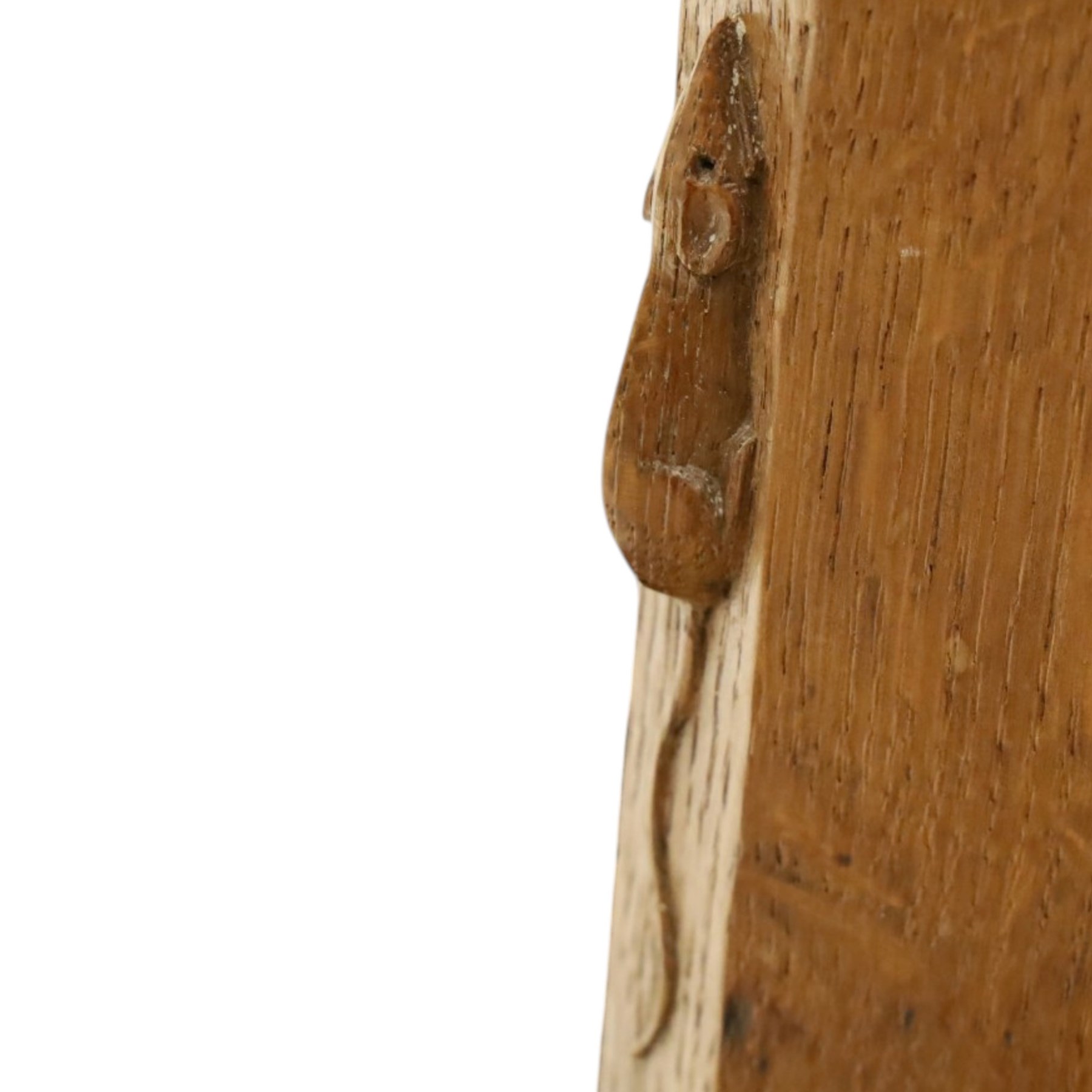 Mouseman - early-to-mid 20th century adzed and panelled oak chest, raised back over rectangular adzed top with canted corners, fitted with two short over three long drawers with turned knob handles, raised on octagonal feet, with carved mouse signature, by the workshop of Robert Thompson of Kilburn