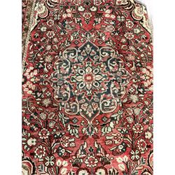 Persian red and beige ground rug, all-over pattern with repeating border
