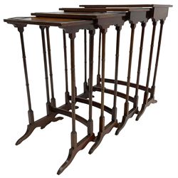 20th century inlaid mahogany quartetto nest of four tables, rectangular top inlaid with birdseye maple oval panel, ring turned supports on sledge feet