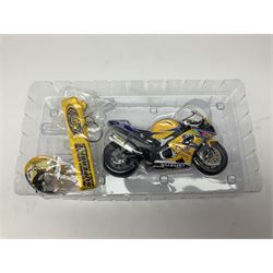 Three Minichamps 1:12 scale die-cast models of motorcycles - Suzuki GSX-R1000 Team Alstare Suzuki Corona Extra Troy Corser WSB 2005; Yamaha YZR-M1 Gauloises Yamaha Team Colin Edwards MotoGP Laguna Seca 2005; and Honda NSR 500 Loris Capirossi MotoGP 2002; all boxed (3)