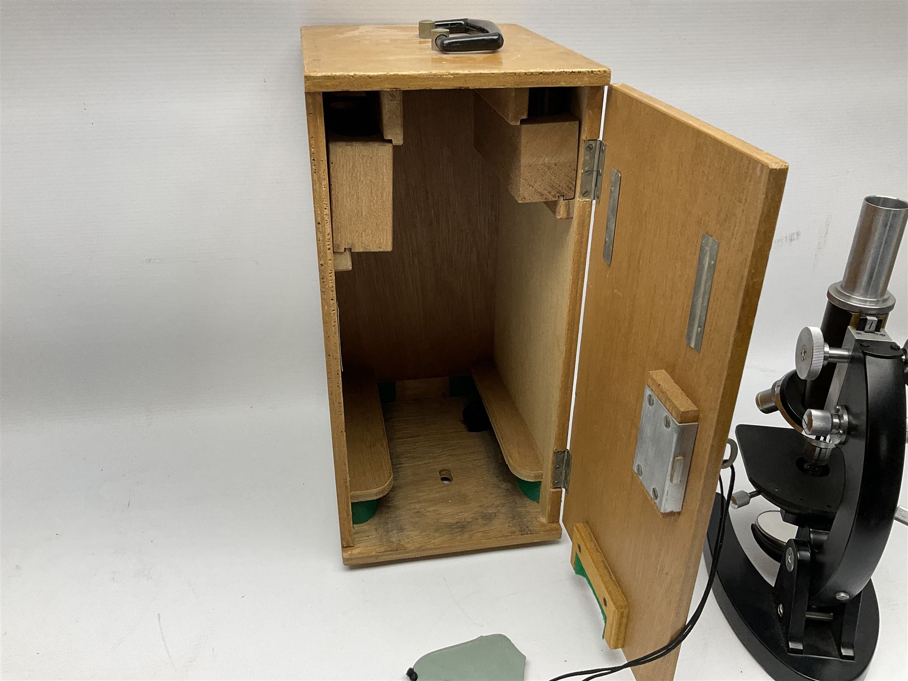 ASA Tokyo monocular microscope with black body, pitchfork base and wooden carrying box containing additional lenses No.47324 H29cm; Universal Avometer Model 8x Mk.III (Panclimatic); and Dansette 222 portable transistor radio (3)