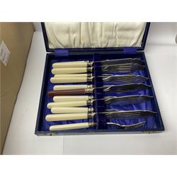 Collection of metalware to include flatware with silver ferrules, tankards goblets etc  in two boxes 