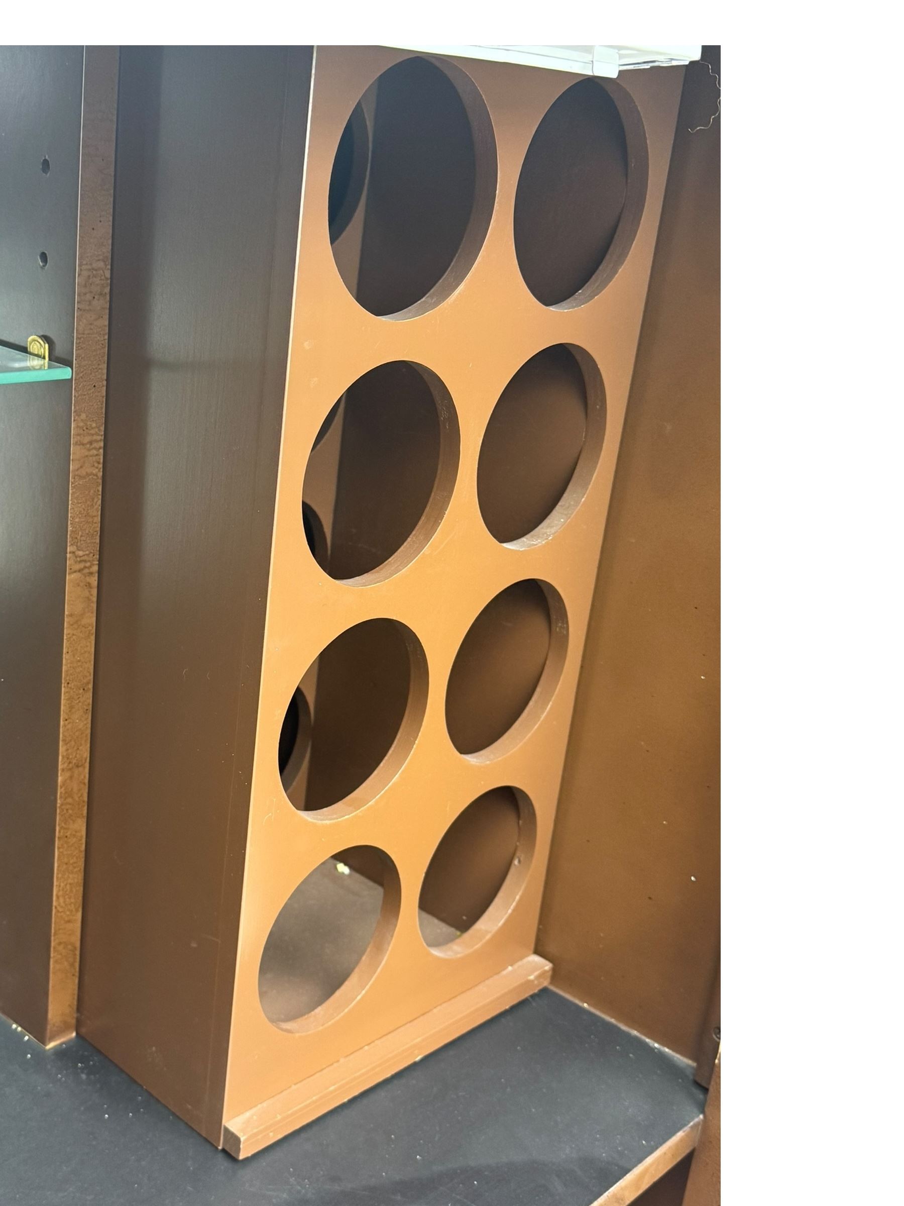 Chinese brown lacquered cocktail cabinet, decorated with gilt scenes of a traditional landscape with figures, pagodas, and mountainous scenery, double doors opening to reveal fitted interior with mirrored back, wine rack, shelves and cupboard, raised on square supports