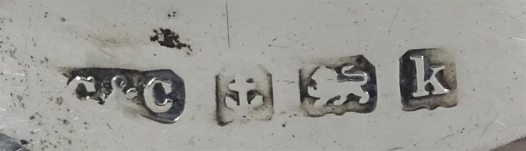 Edwardian silver three branch epergne by Cohen & Charles, Birmingham 1909 and two other silver specimen vases by Sydney & Co, Birmingham 1915