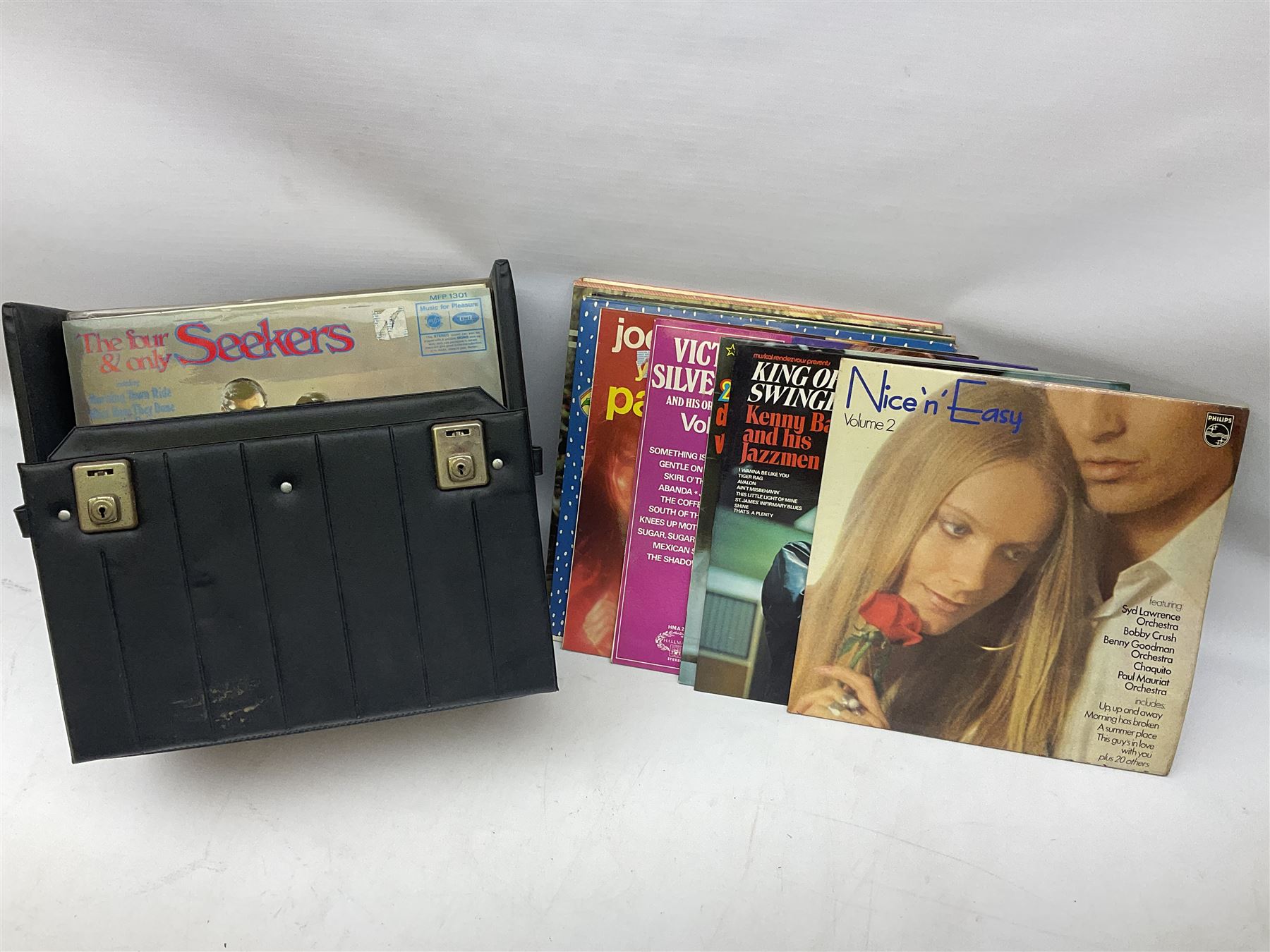 Large quantity of vinyl LPs, predominantly rock and pop, to include Elvis, Elton John, The Kinks, Deep Purple, Eurythmics, Whitney Houston, Phil Collins, Rolling Stones etc, in three boxes, together with quantity of 45 rpm records, Steepletone SRP1R-11 record player and record carry case