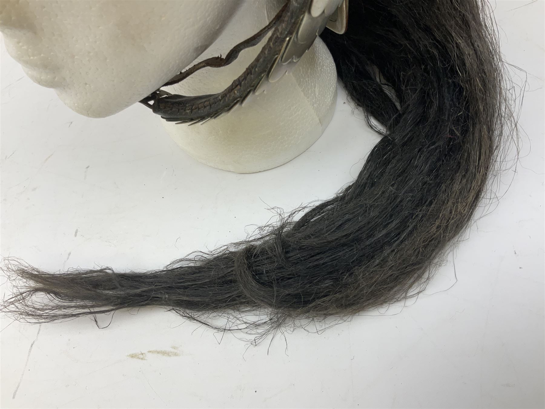 French Model 1913 mounted gendarmerie helmet; brass bodied with nickel mounts, chin strap, comb and horse-hair H27cm (no liner)