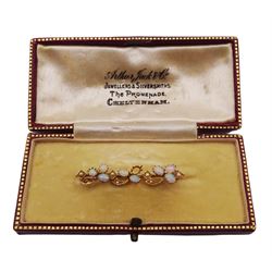 18ct gold opal and seed pearl bar brooch, stamped 18, boxed