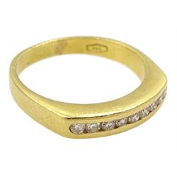 18ct gold channel set nine stone round brilliant cut diamond ring, stamped 750