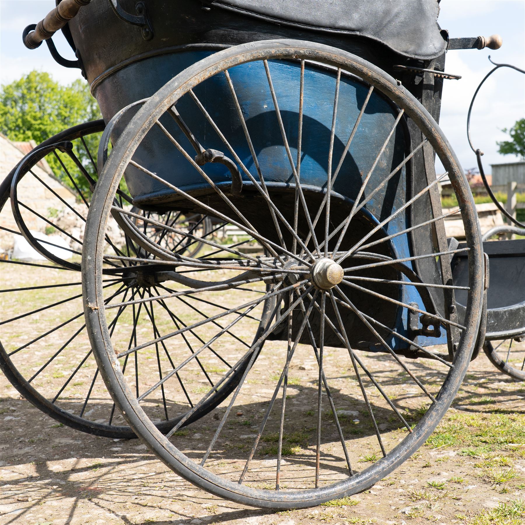 Victorian Bath Chair / Invalid Carriage Converted for Horse Drawn Use

A Victorian bath chair or invalid carriage, later converted for horse drawn use, with black painted bodywork, blue side panels, folding black leather hood and upholstered single passenger seat. The carriage is fitted with large rear wire spoked wheels, smaller front steering wheels, long shafts, footwell and curved body sides, consistent with a late nineteenth century invalid carriage or bath chair form adapted for pony or light horse use.

Features

Bath chair or invalid carriage form
Later converted for horse drawn use
Folding black leather hood
Single upholstered passenger seat
Deep footwell
Black painted body with blue side panels
Large rear wire spoked wheels
Smaller front steering wheels
Long shafts
Lightweight carriage frame

Dimensions:
Overall length: 380 cm
Body length: 204 cm
Width: 88 cm
Height: 178 cm

Wheel Diameters:
Front wheels: 47 cm
Rear wheels: 88 cm

Seating:
Driver: 1
Passenger: None