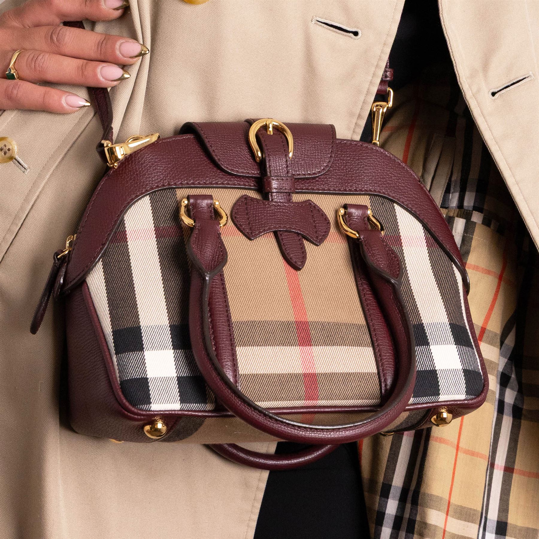 Burberry - ‘Milverton’ Small House Check Bag, introduced circa 2015 under Christopher Bailey, in signature Haymarket check canvas with oxblood grained leather trim and belted front detail, with rolled top handles and detachable shoulder or crossbody strap, with gold-tone hardware, unused with original dust bag