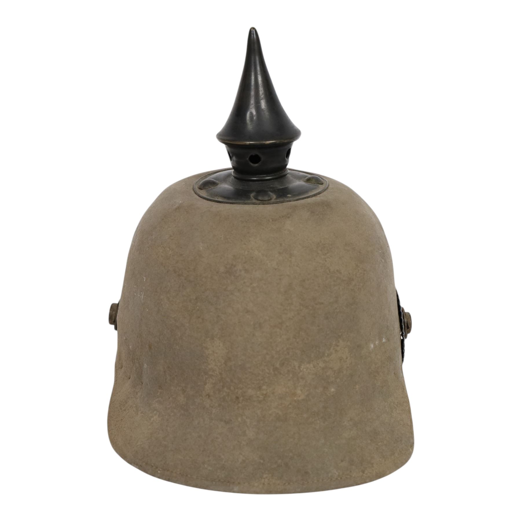 WWI Prussian 57th regiment Ersatz felt Pickelhaube, the grey felt skull with steel spike finial, stitched with green felt 57, chin strap, one side with a black cockade, the other black and red