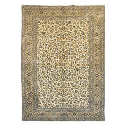 Central Persian Ardakan hand-knotted carpet, ivory field finely decorated with a symmetric...