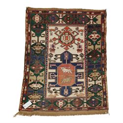 Caucasian Soumak flatweave rug, ivory field with a bold central geometric medallion framed...