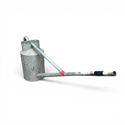 Eight early 20th century galvanised watering cans